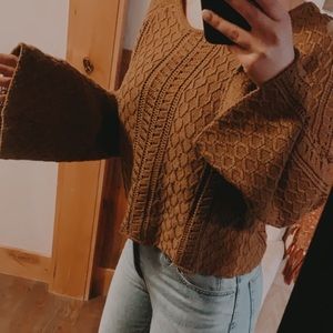 Cropped sweater with bell sleeves